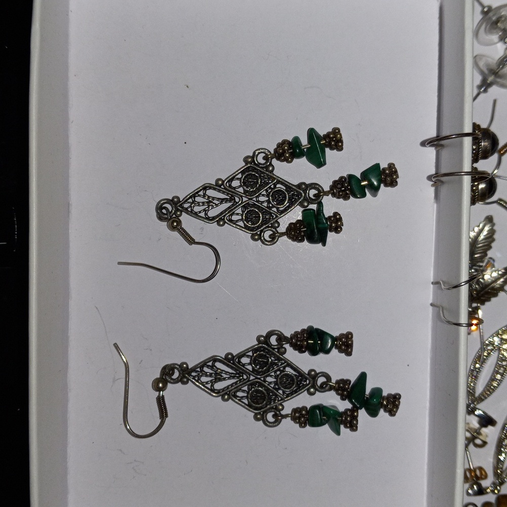 Beautiful  dangling earrings  greenness stones
